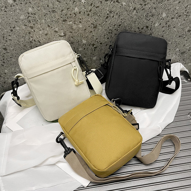 Crossbody torba, ulični stil, Oxford platno, vertikalni kvadratni oblik, zatvaranje zipom, unutarnji džepovi: džep sa zipom, džep za telefon, zip s tipom sendvič