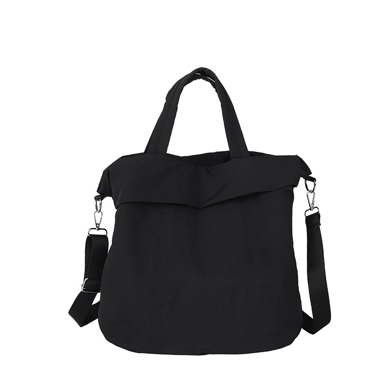 Torba Tote od Oxford materijala, crossbody stil, oblik kante, zatvaranje zipom, unutarnji džep sa zip zatvaračem.