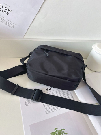 Unisex crossbody torba, vodootporna najlon konstrukcija, više džepova, zatvarač i džep za telefon