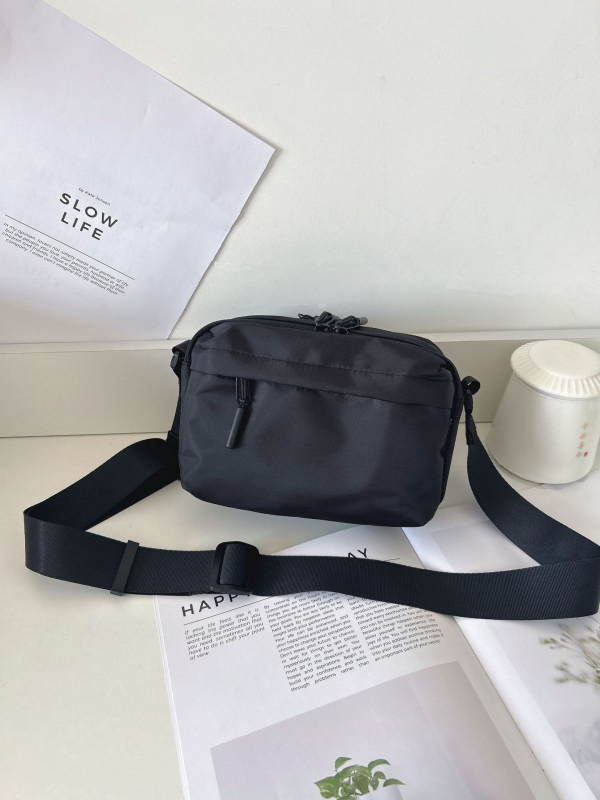 Unisex crossbody torba, vodootporna najlon konstrukcija, više džepova, zatvarač i džep za telefon
