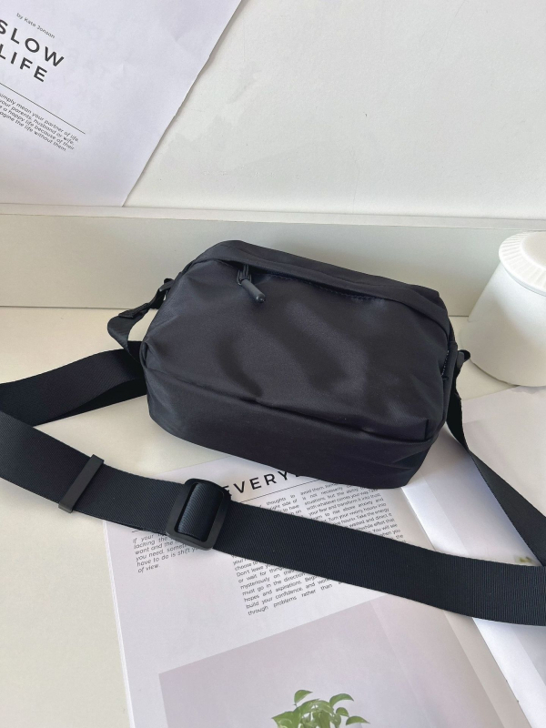 Unisex crossbody torba, vodootporna najlon konstrukcija, više džepova, zatvarač i džep za telefon