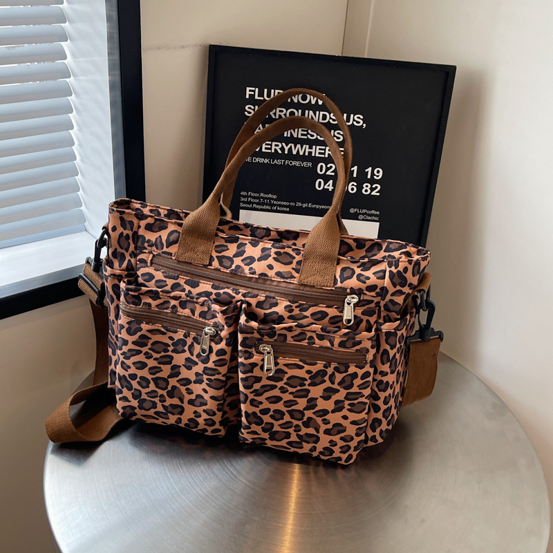 Torba tote s leopard printom - Velika kapaciteta (Oxford tkanina, zatvarač, horizontalni kvadratni oblik, poliester podstava, unutarnji džepovi za telefon i karticu)