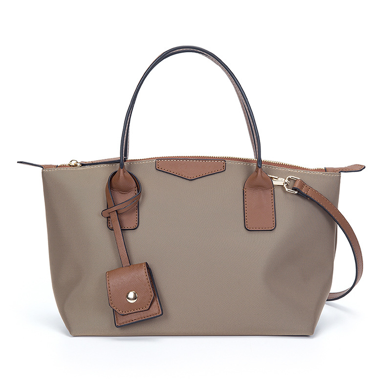 Tote táska, dumpling formájú, Oxford anyagból, cipzáras nyitás, poliészter bélés, három vállpánt