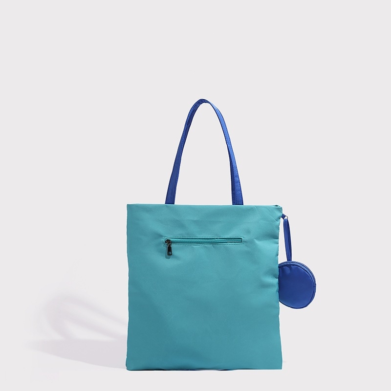 Torba od Oxford platna, urban minimalističkog stila, zatvarač, poliester podstava, vertikalni kvadratni oblik