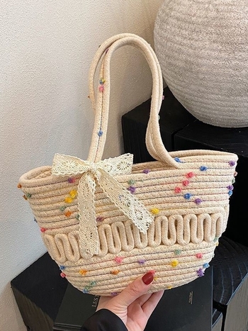 Elegantna pletena torbica tip bucket s mašnicom — od pamukovog užeta, otvoren vrh, dvostruke ručke, džep za telefon