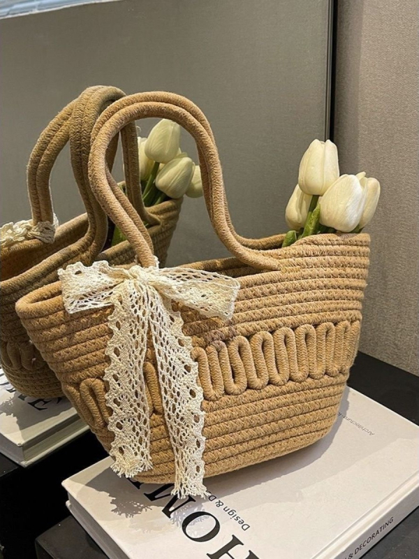 Elegantna pletena torbica tip bucket s mašnicom — od pamukovog užeta, otvoren vrh, dvostruke ručke, džep za telefon