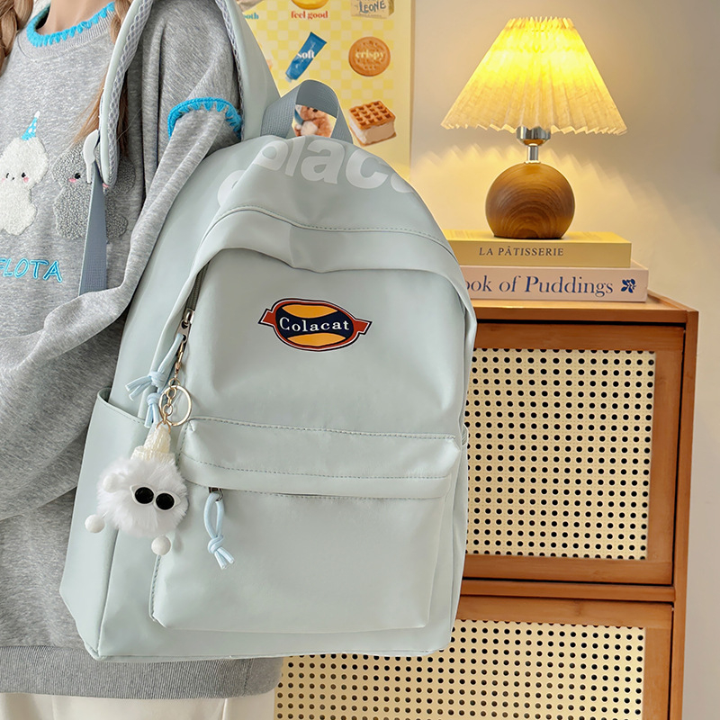 Skolēnu mugursoma ar lielu ietilpību 36-55 L, neilona audums, ūdensizturīga un izturīga, ietilpst 14 collu klēpjdators, gaisa spilvenu siksnas, pilsētas minimālais stils