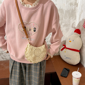 Pletena ženska torbica preko ramena — Saddle Bag stil (Materijal: Line; Oblik: Kružni; Način zatvaranja: Poklopac; Podstava: Poliester; Sezona: proljeće 2025)