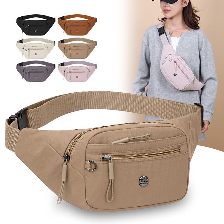 Crossbody torba s minimalističkim dizajnom i tihim luksuzom; najlon materijal; podstava od poliestera; zatvarač; džep za mobitel; horizontalni kvadratni oblik