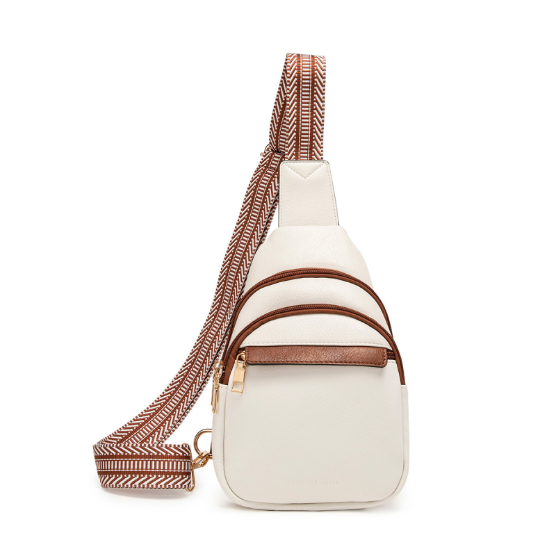Crossbody torbica od PU materijala, ovalni oblik, zatvaranje na zip, unutarnja džep s džepom za ID - Charm Infinite