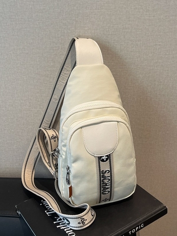 Ženska nylon crossbody torba, gradski stil, zatvaranje na zip, unutarnja zip pretinac i džep za ID – proljeće 2025