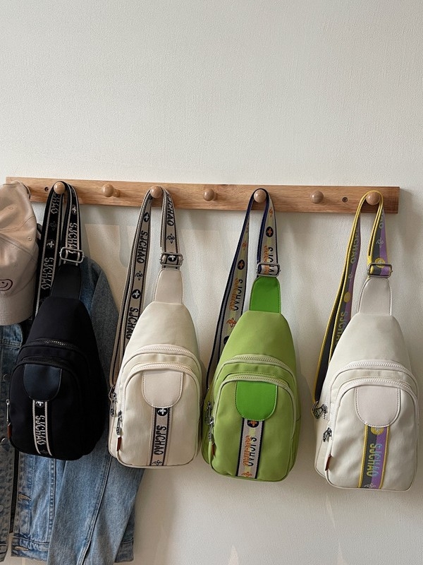 Ženska nylon crossbody torba, gradski stil, zatvaranje na zip, unutarnja zip pretinac i džep za ID – proljeće 2025