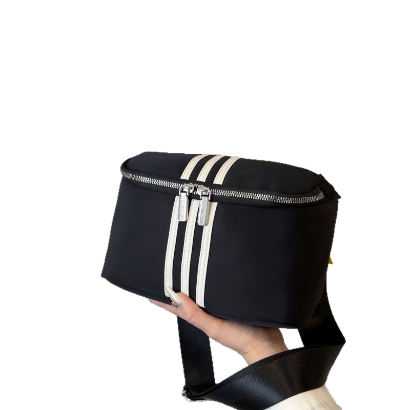 Ženska nylon crossbody torbica, mala veličina, gradski stil, lagana, s džepom na zip.