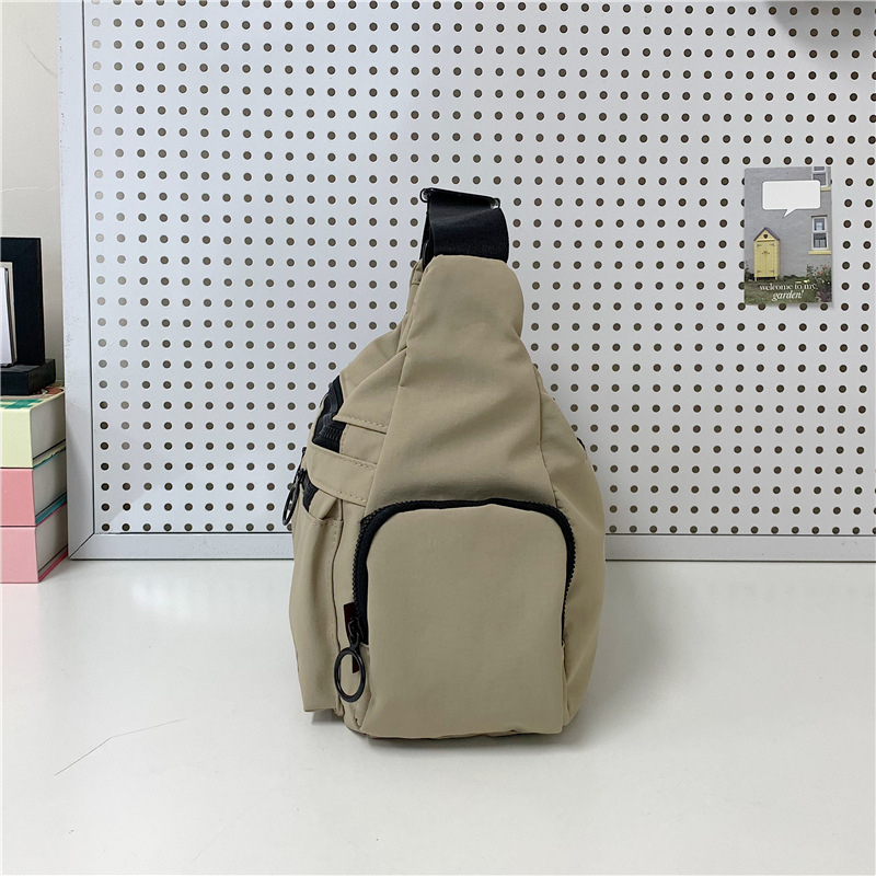 Crossbody torbica: gradska jednostavnost, Oxford tkanina, vodoravni kvadratni oblik, zatvarač na zip