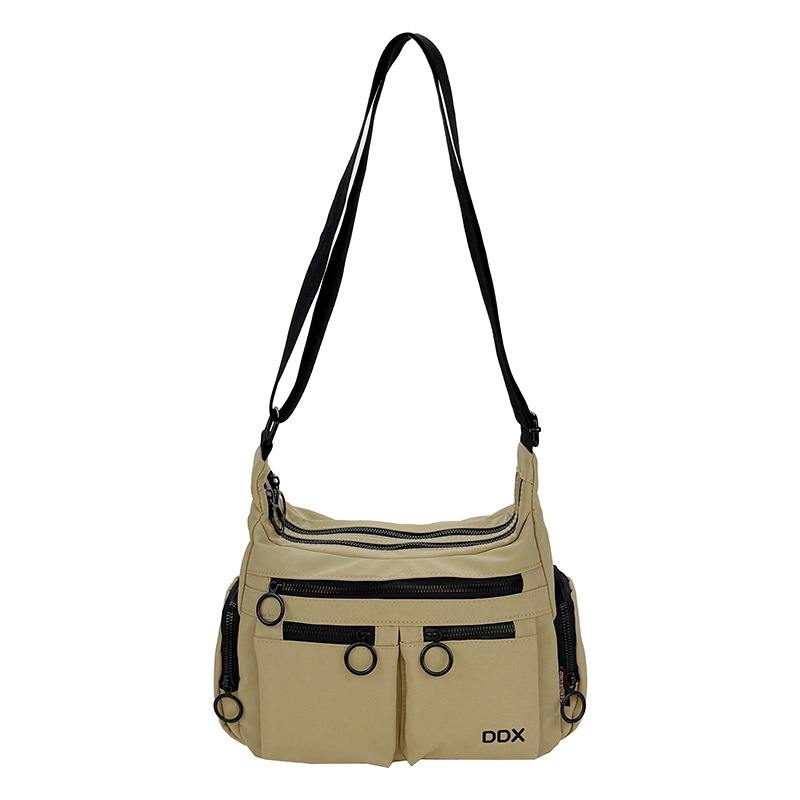 Crossbody torbica: gradska jednostavnost, Oxford tkanina, vodoravni kvadratni oblik, zatvarač na zip