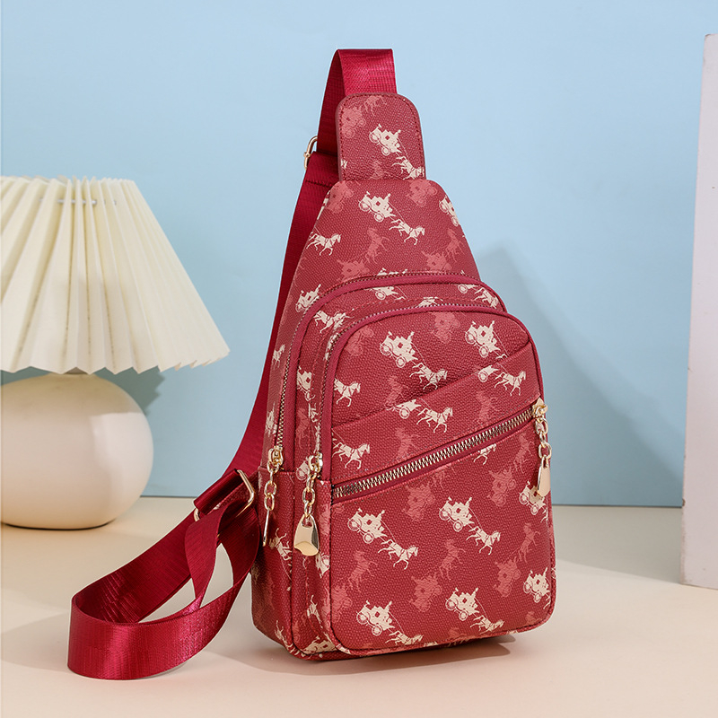 Ženska crossbody torba – PU materijal; poliester podstava; zatvarač; unutarnja ID pretinac; trodimenzionalni vanjski dizajn