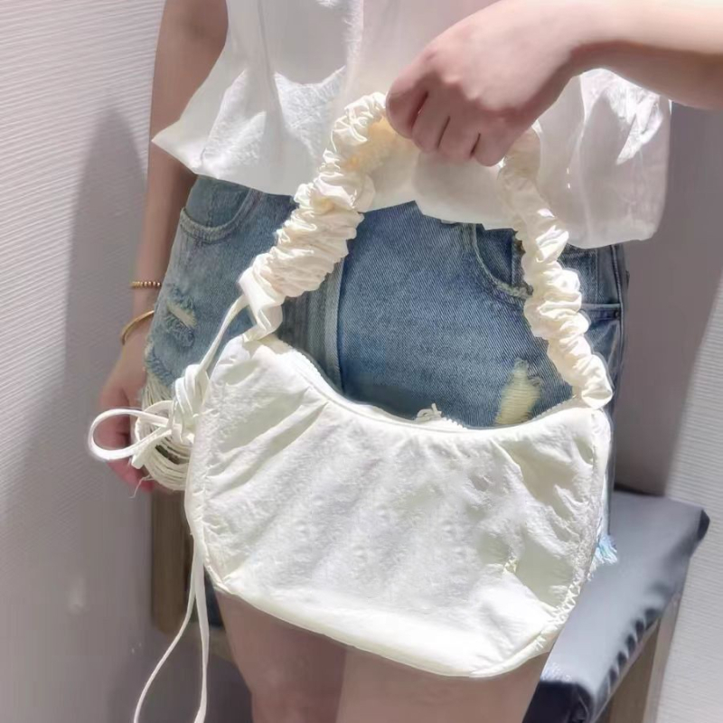 Nylon torbica preko ramena u obliku knedle, s zatvaračem, pretinica za mobitel, brend Qian baiyue