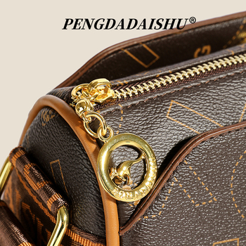 Ženska torbica za rame oblik jastučastog tipa, PU materijal, podstava od poliester, zatvaranje zatvaračem, unutarnja džep s zatvaračem