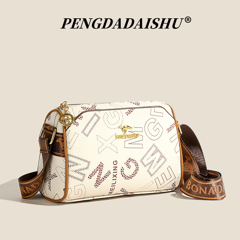 Ženska torbica za rame oblik jastučastog tipa, PU materijal, podstava od poliester, zatvaranje zatvaračem, unutarnja džep s zatvaračem