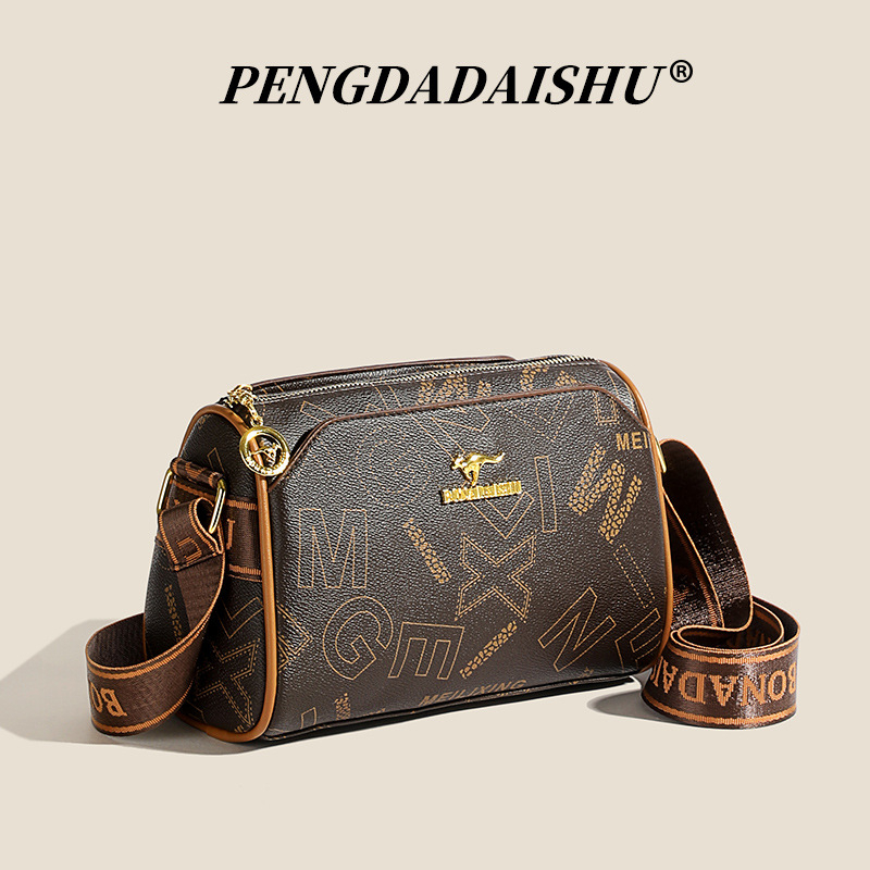 Ženska torbica za rame oblik jastučastog tipa, PU materijal, podstava od poliester, zatvaranje zatvaračem, unutarnja džep s zatvaračem