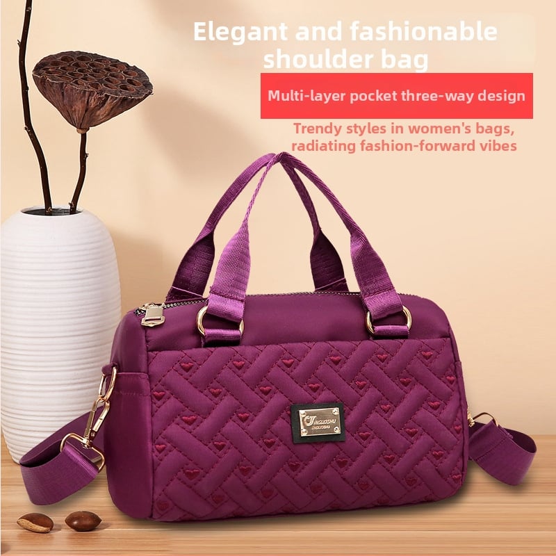 Ženska crossbody torba, srednje veličine, tkanina, uspravni kvadratni oblik, zatvaranje na zip, unutarnje pretince: zip pretinac, pretinac za telefon, pretinac za dokumente, jedna naramenica, podstava poliester