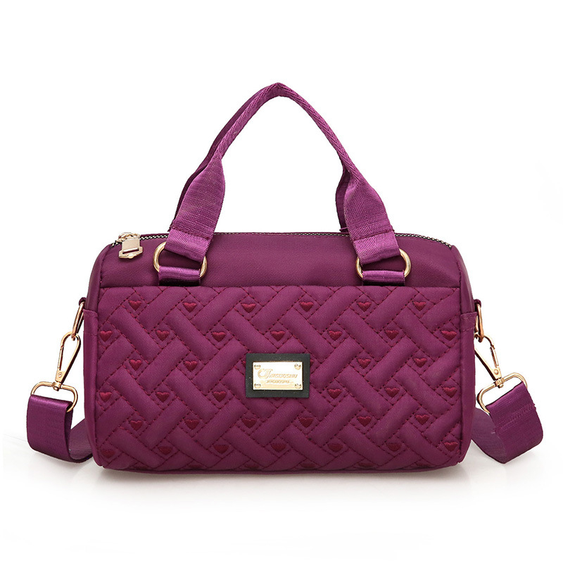 Ženska crossbody torba, srednje veličine, tkanina, uspravni kvadratni oblik, zatvaranje na zip, unutarnje pretince: zip pretinac, pretinac za telefon, pretinac za dokumente, jedna naramenica, podstava poliester