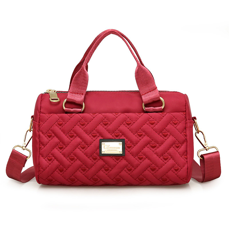 Ženska crossbody torba, srednje veličine, tkanina, uspravni kvadratni oblik, zatvaranje na zip, unutarnje pretince: zip pretinac, pretinac za telefon, pretinac za dokumente, jedna naramenica, podstava poliester