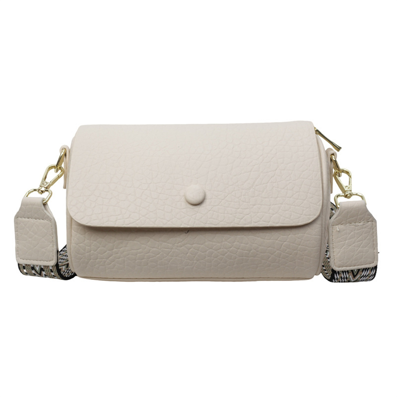 Cilindrična crossbody torba, PU materijal, podstava od poliestera, unutarnji džep sa zatvaračem, zatvarač s poklopcem, jedna naramenica