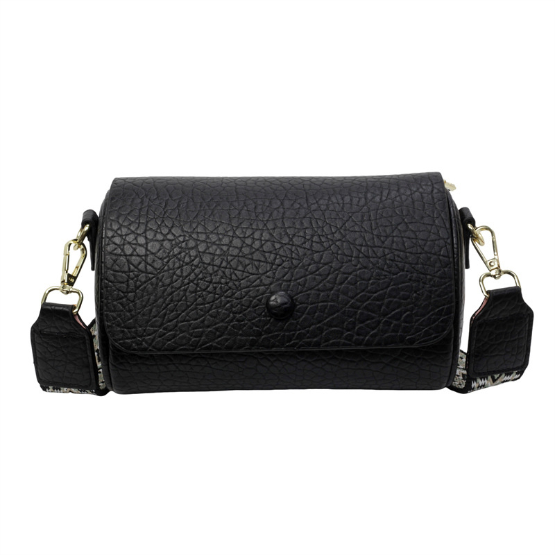 Cilindrična crossbody torba, PU materijal, podstava od poliestera, unutarnji džep sa zatvaračem, zatvarač s poklopcem, jedna naramenica
