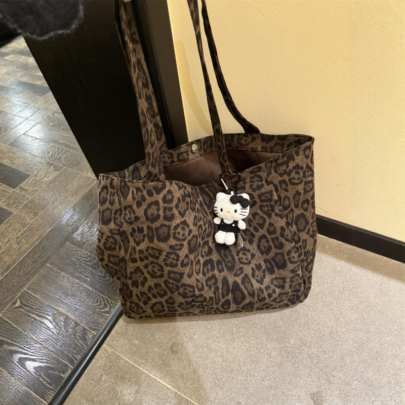 Torba preko ramena tip tote, leopard uzorak, gradski minimalistički stil, poliester materijal, vodoravni kvadratni oblik, unutarnja kapsa sa zipom
