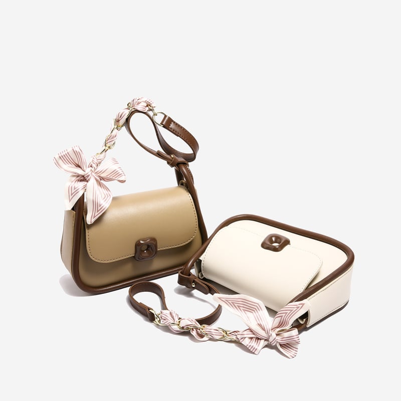Ženska crossbody torbica u gradskom minimalističkom stilu, PU materijal, horizontalno kvadratičnog oblika, magnetsko zatvaranje, jednostruka naramenica, unutarnja organizacija: džep sa zipom i džep za telefon