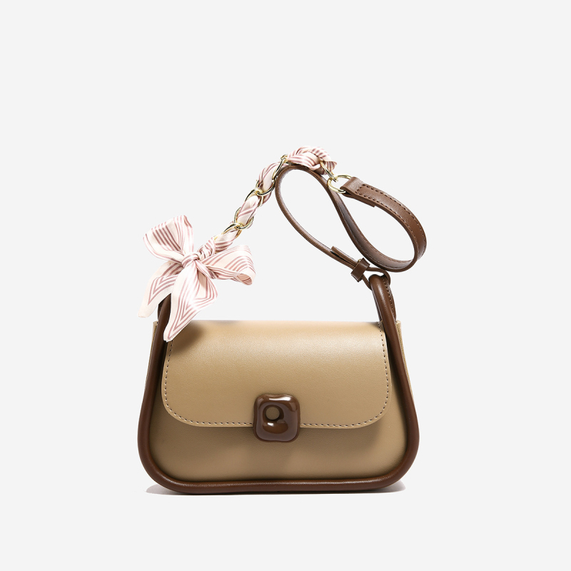 Ženska crossbody torbica u gradskom minimalističkom stilu, PU materijal, horizontalno kvadratičnog oblika, magnetsko zatvaranje, jednostruka naramenica, unutarnja organizacija: džep sa zipom i džep za telefon