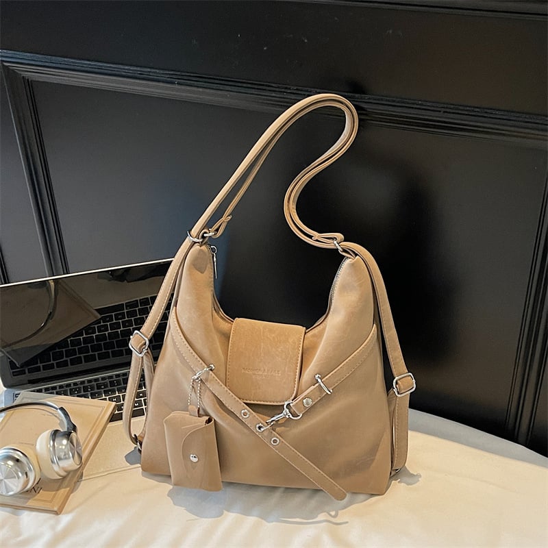 Bőr Tote crossbody táska, függőleges négyzetes alak, kapucsukásos zárás, belső zsebek telefonhoz és dokumentumokhoz