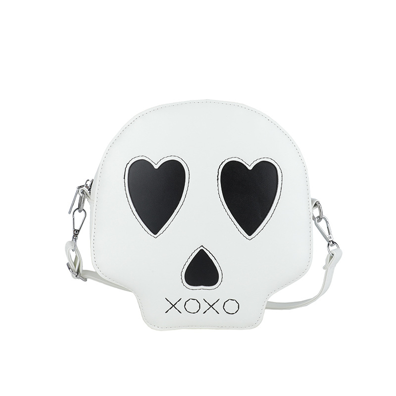 Okrugla PU crossbody torbica sa motivom lubanje, najlonska podstava, zatvarač, jedna naramenica