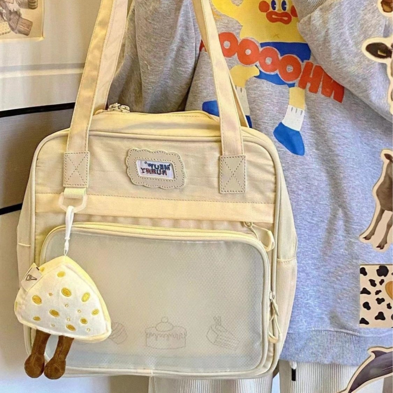 Auduma crossbody skolas soma, ietilpība 36-55 L, der 9 collu klēpjdatoram, izliektā pleca siksna, ielas stils