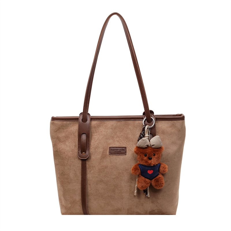 Torba tote u obliku kante, flanel materijal, zatvaranje na zip, podstava od platna, gradski minimalistički stil