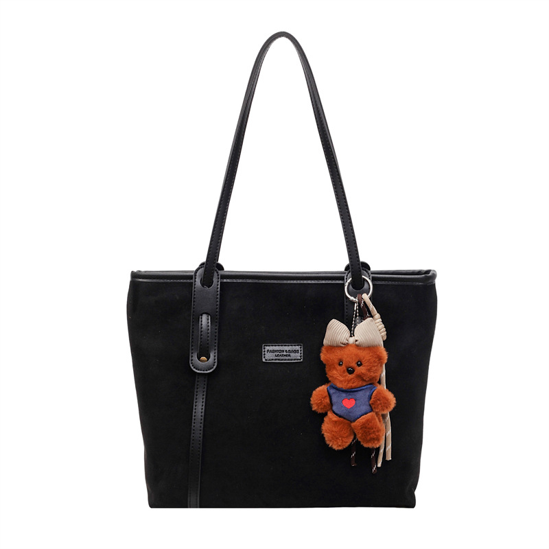 Torba tote u obliku kante, flanel materijal, zatvaranje na zip, podstava od platna, gradski minimalistički stil