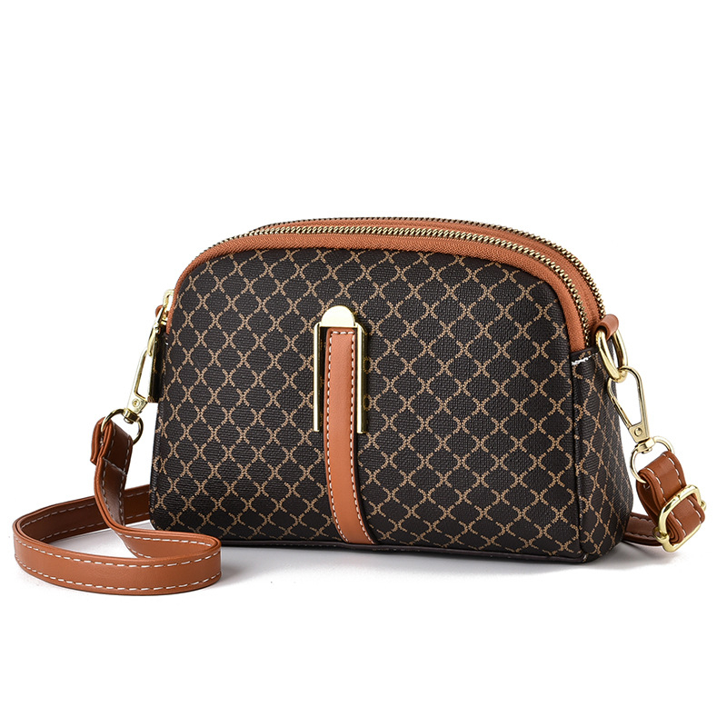 Ženska crossbody torba u ulicnom stilu, dumpling stil, PVC vanjski dio, podstava od poliestera, zatvaranje na zip, unutarnja džep s zipom