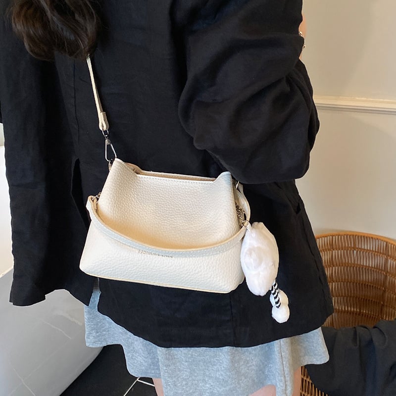 Ženska crossbody torba, gradski minimalistički stil, PU materijal, horizontalni kvadratni oblik, magnetska zatvarač, džep za telefon
