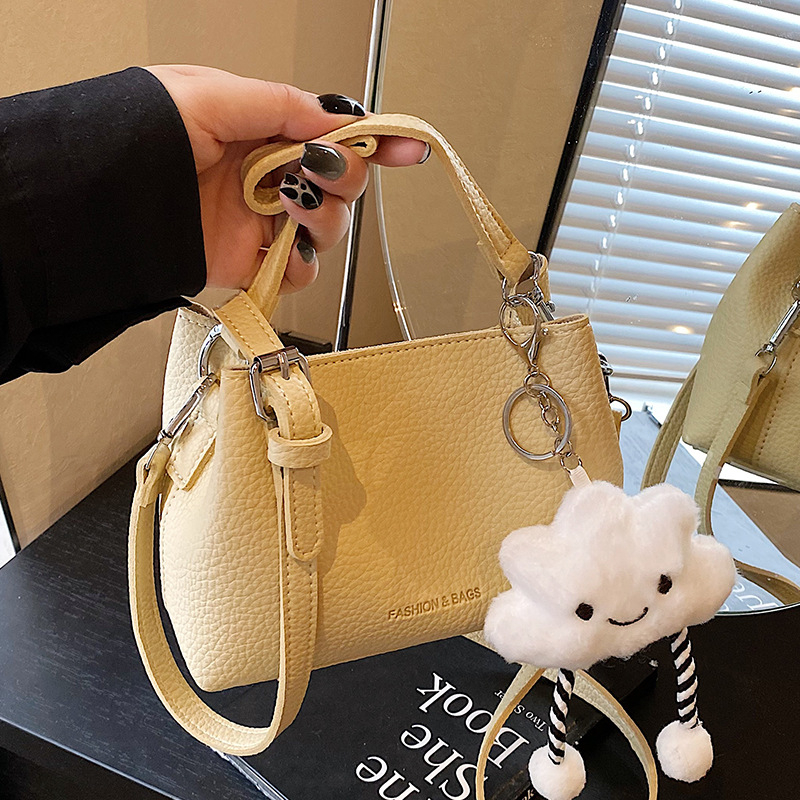 Ženska crossbody torba, gradski minimalistički stil, PU materijal, horizontalni kvadratni oblik, magnetska zatvarač, džep za telefon