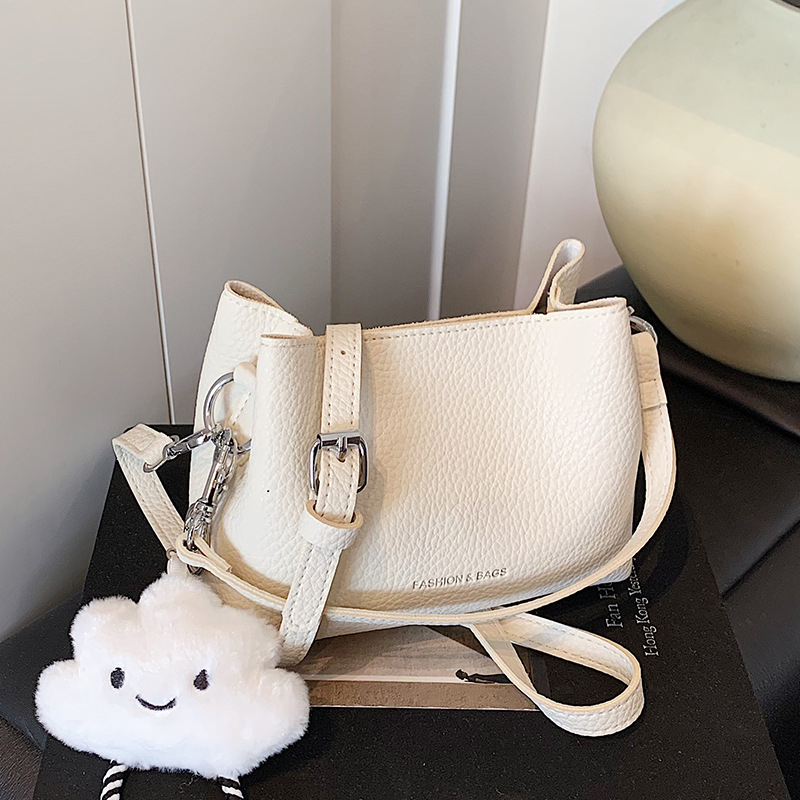 Ženska crossbody torba, gradski minimalistički stil, PU materijal, horizontalni kvadratni oblik, magnetska zatvarač, džep za telefon