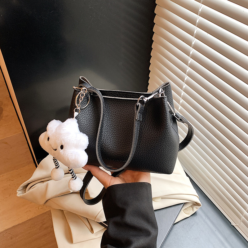 Ženska crossbody torba, gradski minimalistički stil, PU materijal, horizontalni kvadratni oblik, magnetska zatvarač, džep za telefon