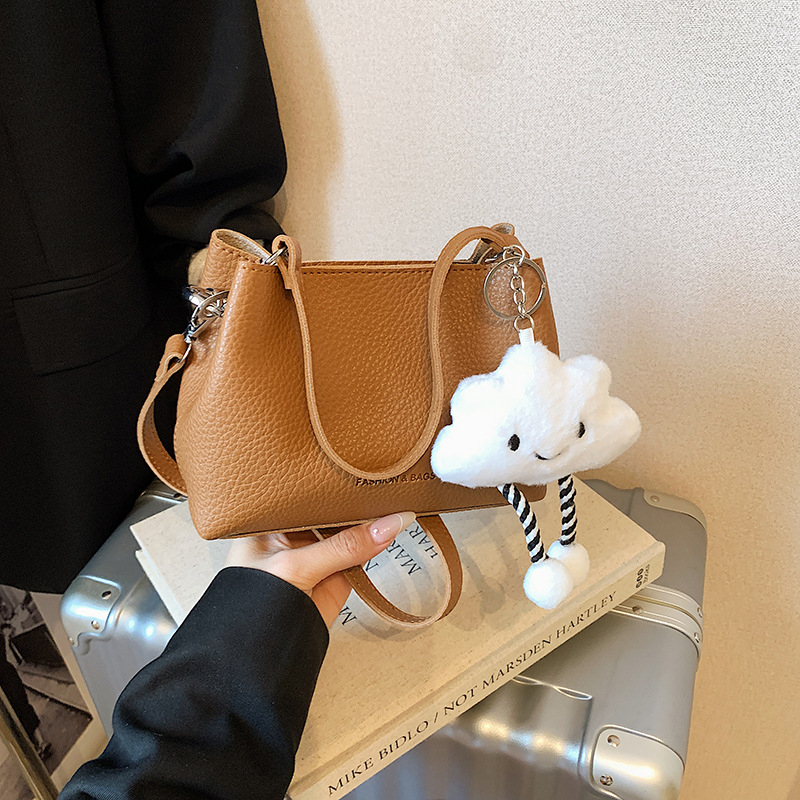 Ženska crossbody torba, gradski minimalistički stil, PU materijal, horizontalni kvadratni oblik, magnetska zatvarač, džep za telefon