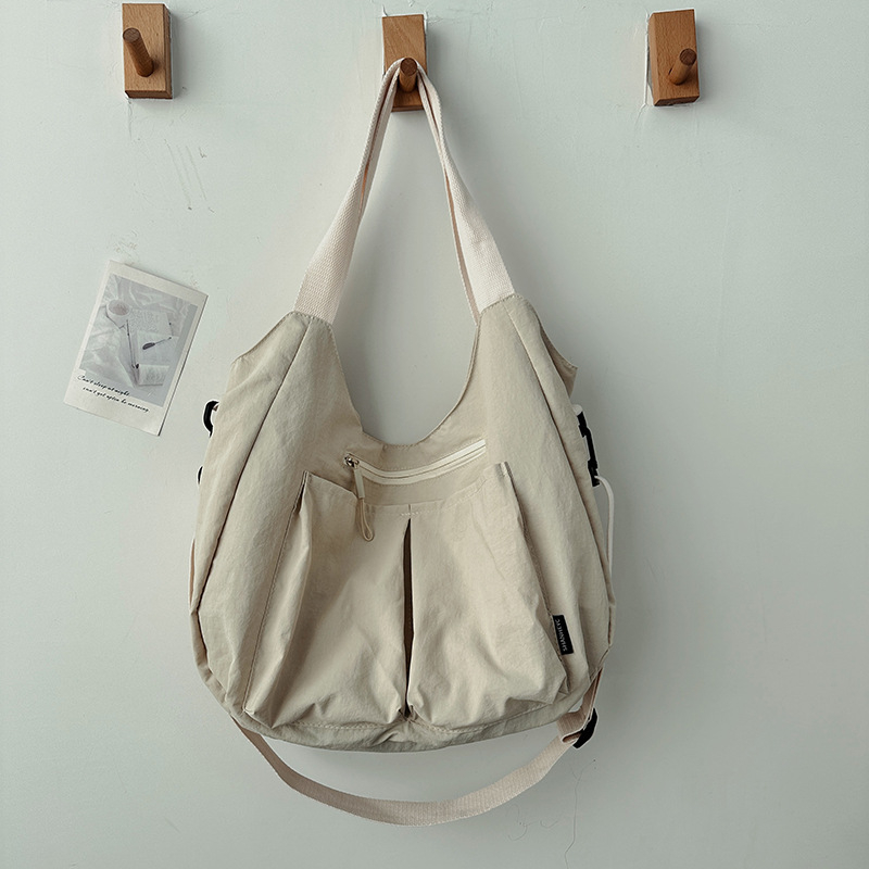 Női tote válltáska, könnyű, nagy kapacitású, nylon anyagú, városi egyszerű stílus, vízszintes négyzetes forma, cipzáras zárás