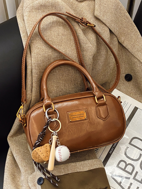 Torba preko ramena crossbody, PU materijal, horizontalni kvadratni oblik, zatvaranje na zip, džepovi za telefon i karticu identiteta, jedna naramenica
