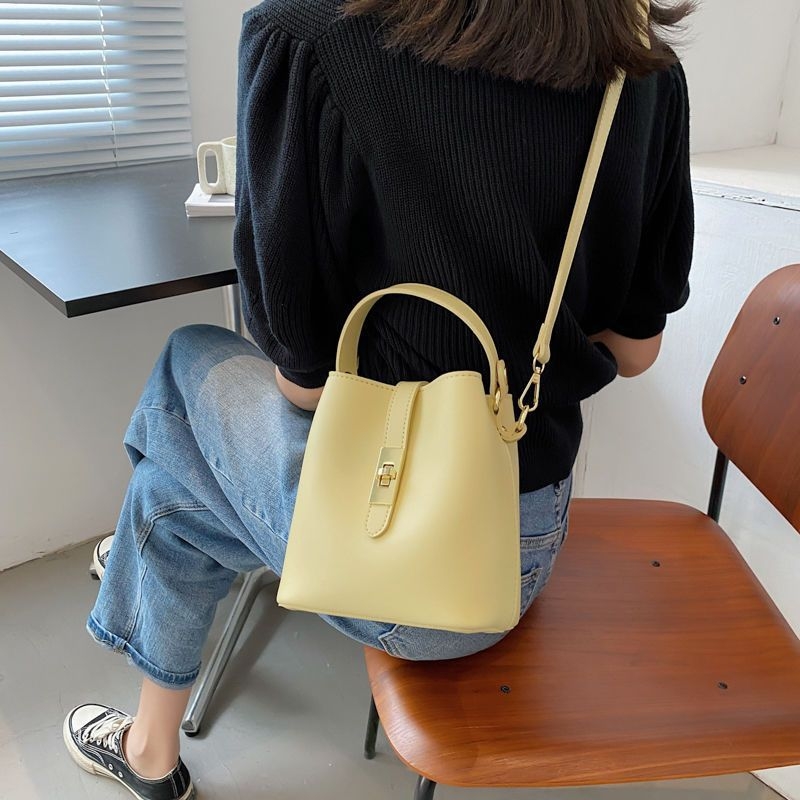 Bucket torba, casual stil, poliester, PU podstava, otvaranje s poklopcem