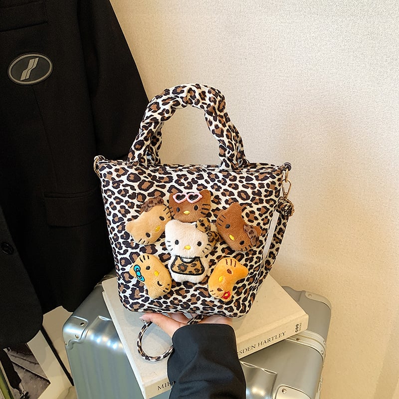Ženska velur bucket torba s leopard printom i motivom mačje lutke, magnetsko zatvaranje, džep za telefon, zima 2025