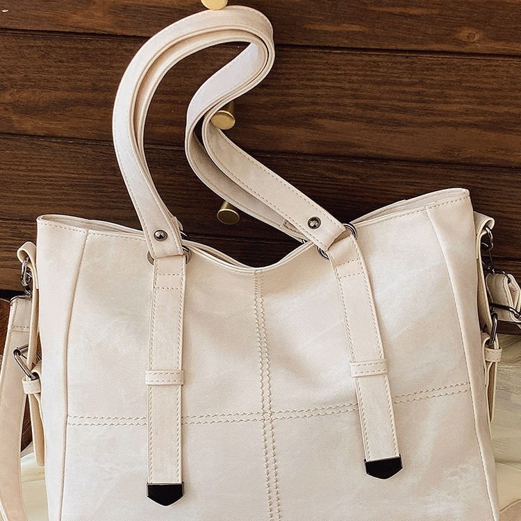 Crossbody torba Jiaen, PU materijal, gradski minimalistički stil, zatvaranje na zip, horizontalni kvadratni oblik