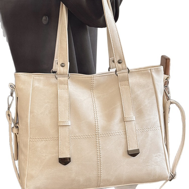 Crossbody torba Jiaen, PU materijal, gradski minimalistički stil, zatvaranje na zip, horizontalni kvadratni oblik