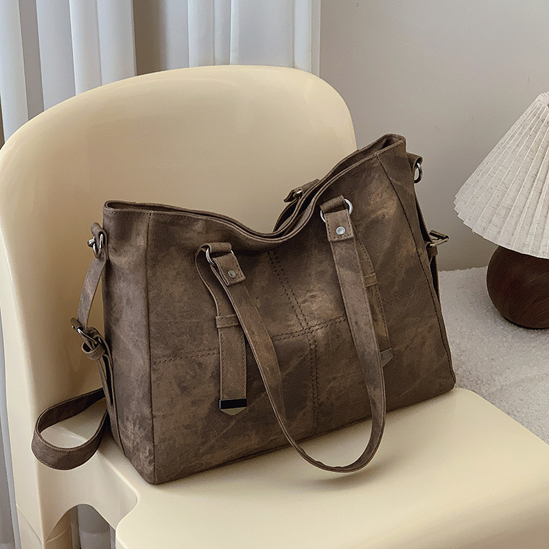 Crossbody torba Jiaen, PU materijal, gradski minimalistički stil, zatvaranje na zip, horizontalni kvadratni oblik